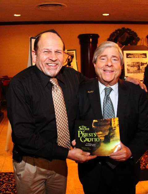 Chris Nicola, author & noted cave explorer presents his book  The Secret of Priest's Grotto to BP Marty Markowitz
